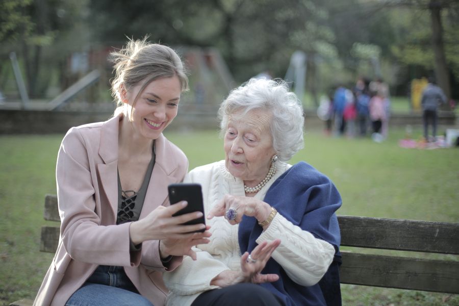 A senior mother and her adult daughter together